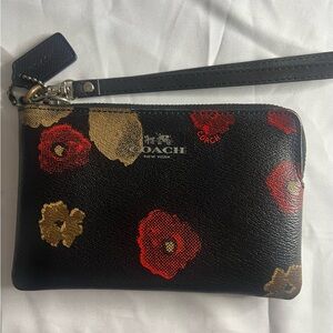 Coach Black Floral Wristlet with Red & Gold Blooms